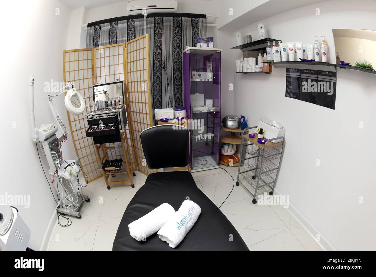The interior of the massage room, massage table in the spa, skin treatment. Stock Photo