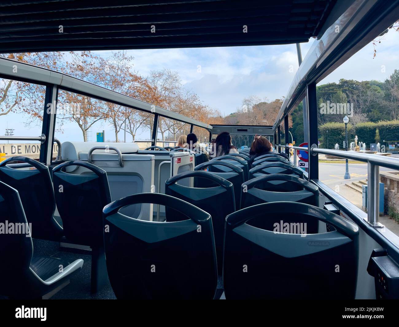 the-few-tourists-taking-a-ride-on-a-tour-bus-in-barcelona-stock-photo