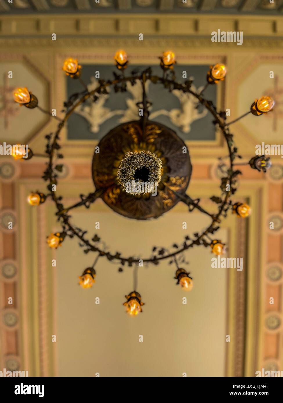 A low angle view of a chandelier on the ceiling Stock Photo