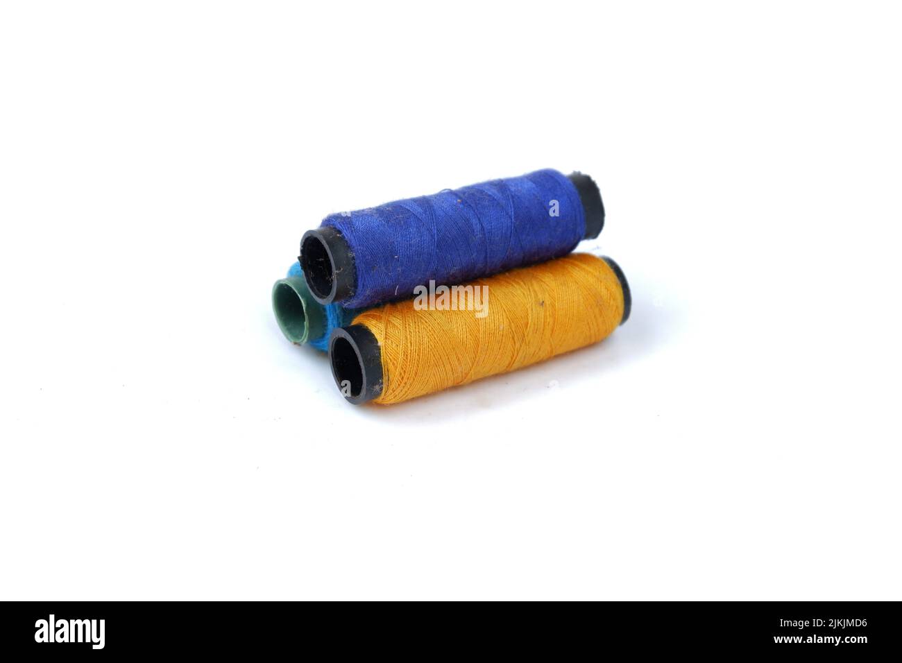 sewing thread isolated on a white background Stock Photo - Alamy