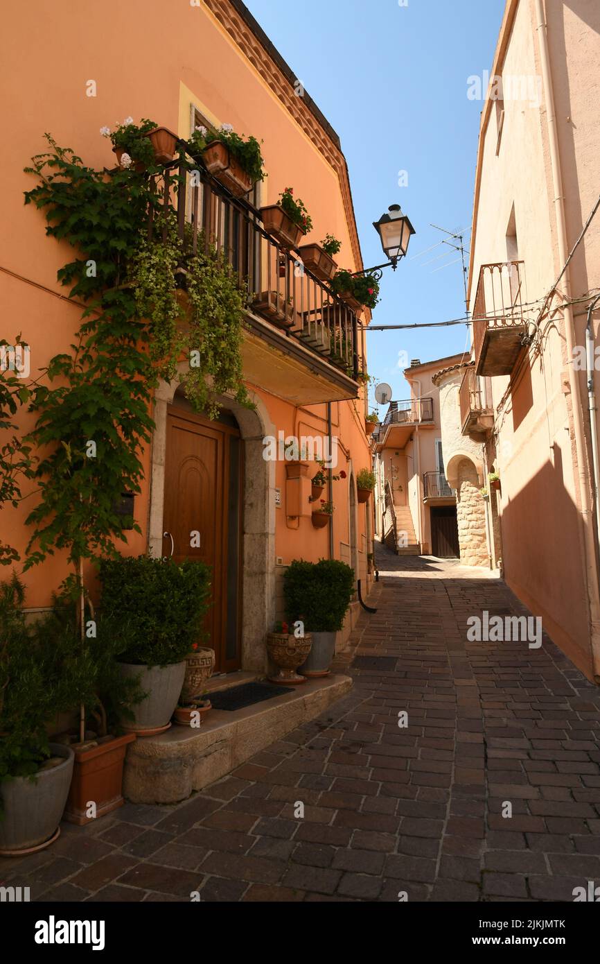 A narrow street in the village of San Fele in the Basilicata region, Italy with the old beautiful houses Stock Photo