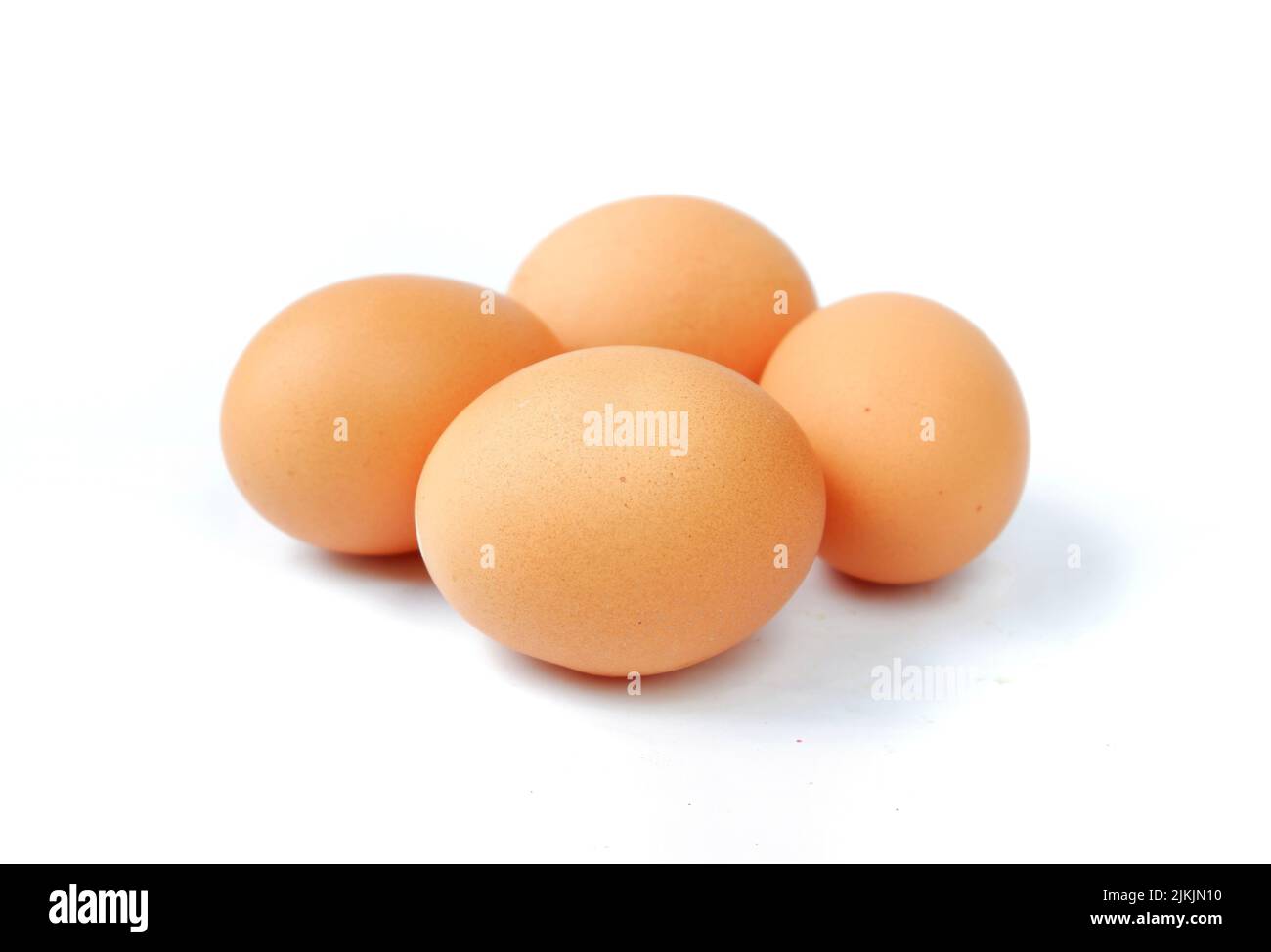 Chicken eggs isolated on a white background Stock Photo