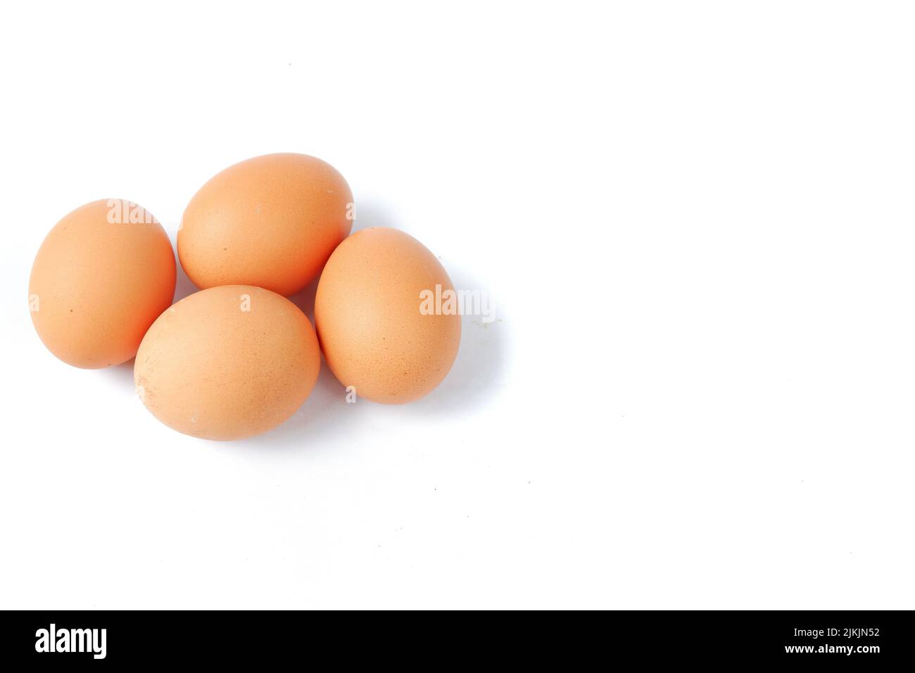 Chicken eggs isolated on a white background Stock Photo - Alamy