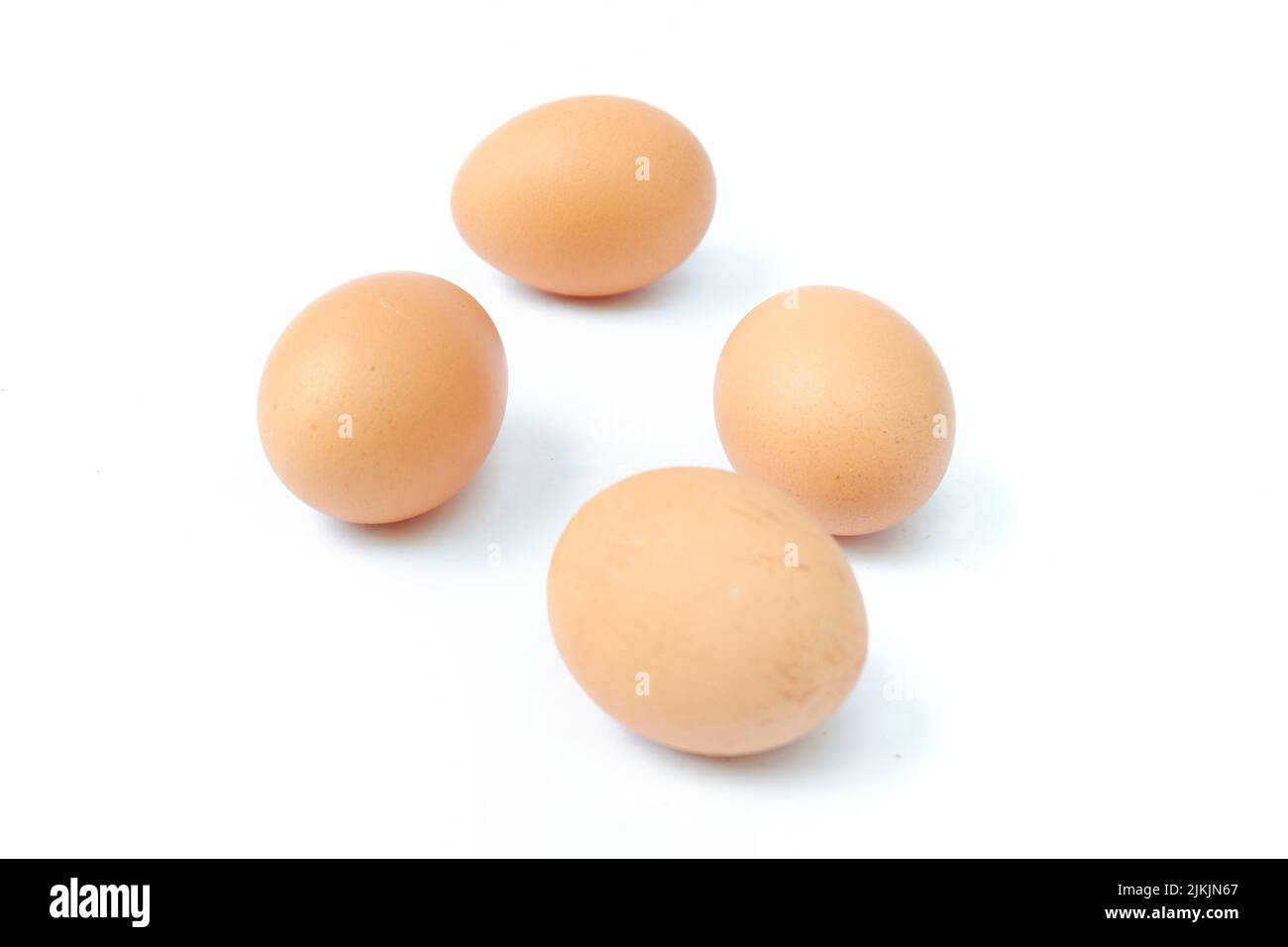 Chicken eggs isolated on a white background Stock Photo - Alamy
