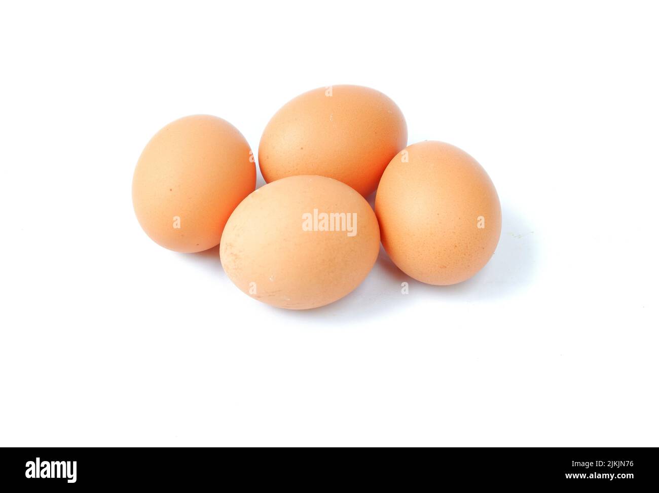 Chicken eggs isolated on a white background Stock Photo - Alamy