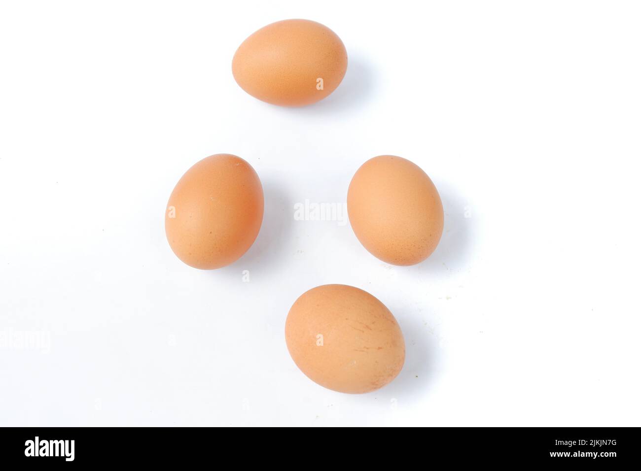 Chicken eggs isolated on a white background Stock Photo - Alamy