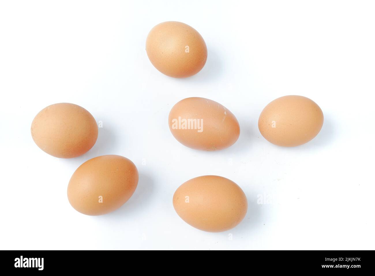 Chicken eggs isolated on a white background Stock Photo - Alamy