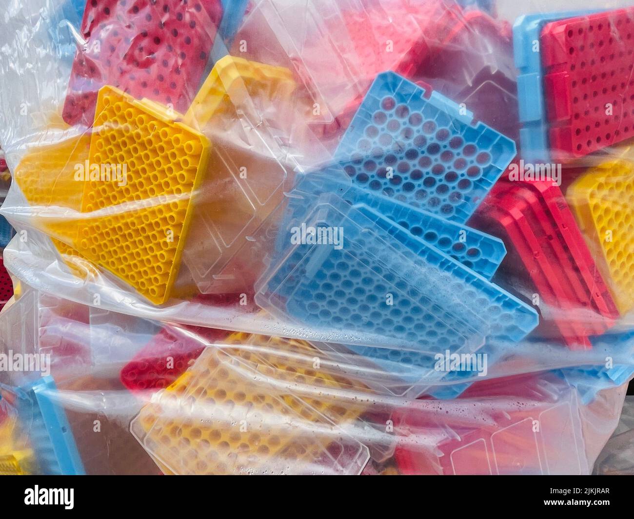 Red, yellow and blue polypropylene plastic waste Stock Photo Alamy