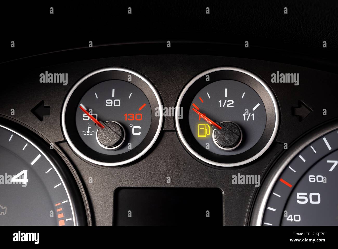 glowing fuel gauge on dashboard Stock Photo Alamy