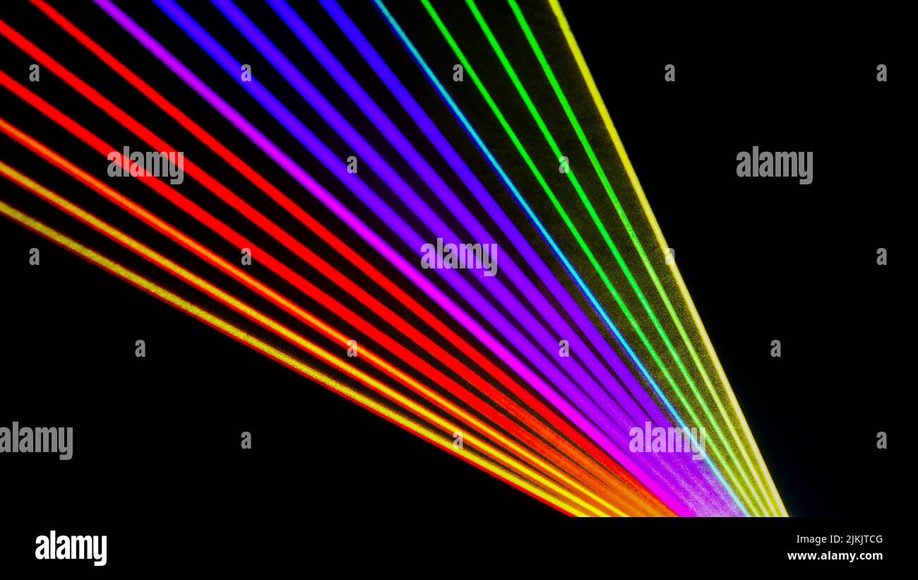 An illustration of the colorful laser lights on a black background