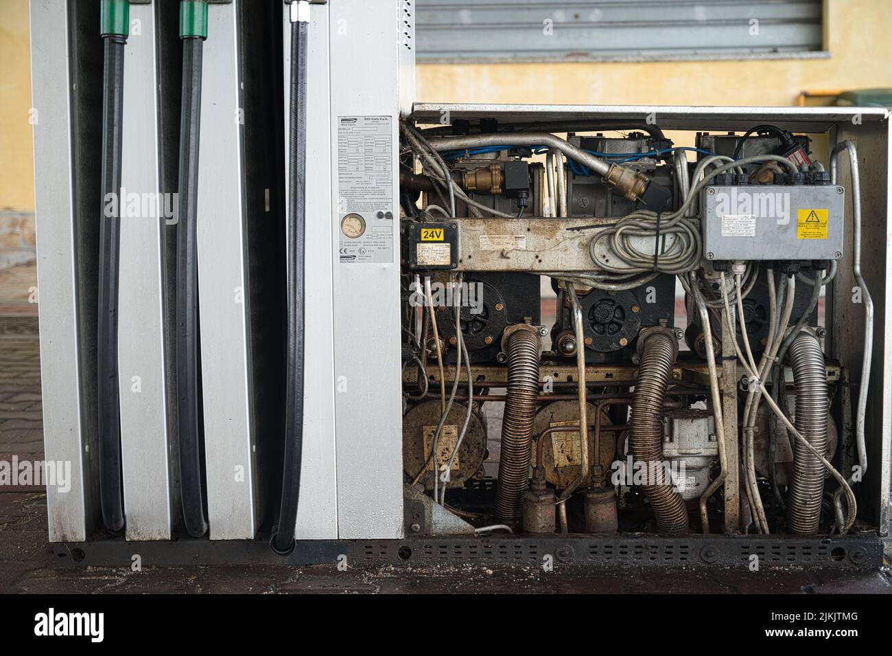 Repairing Gas station pump in Italy Stock Photo Alamy