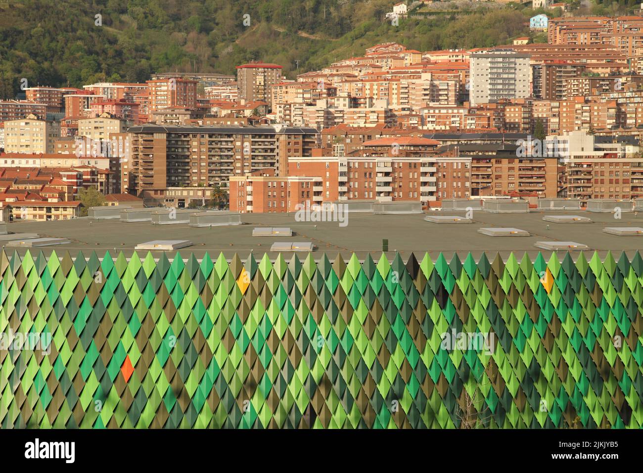 A beautiful view of apartment buildings with small windows in the ...