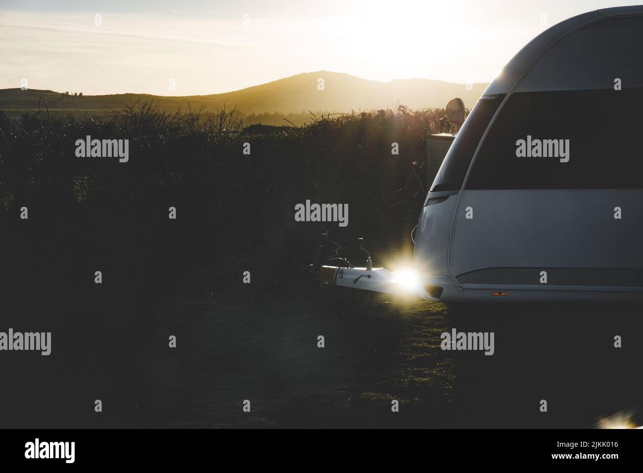 The side view of a driverless train in a countryside Stock Photo