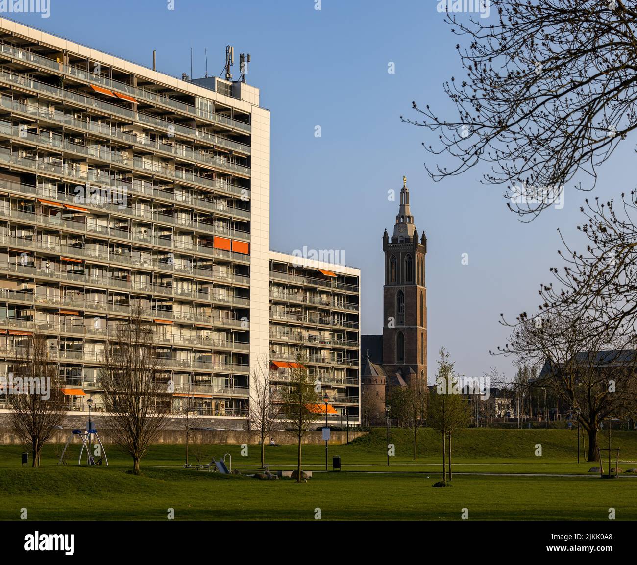 The St. Christopher's Cathedral in the background of apartment buildings, Roermond, Limburg, the Netherlands Stock Photo