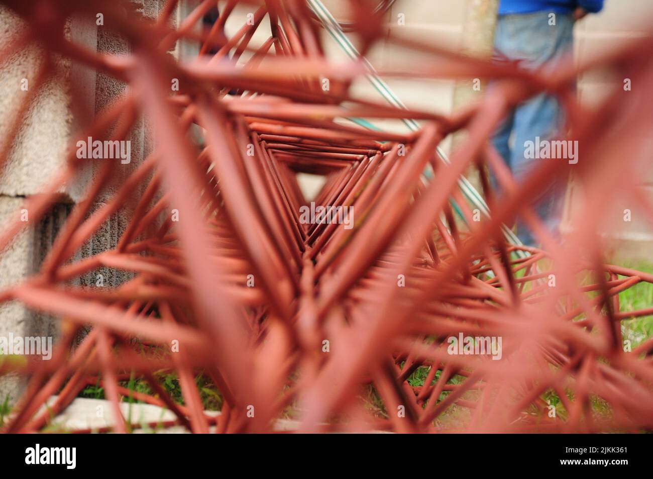 Inner view of a red triangular joist to build a roof Stock Photo Alamy