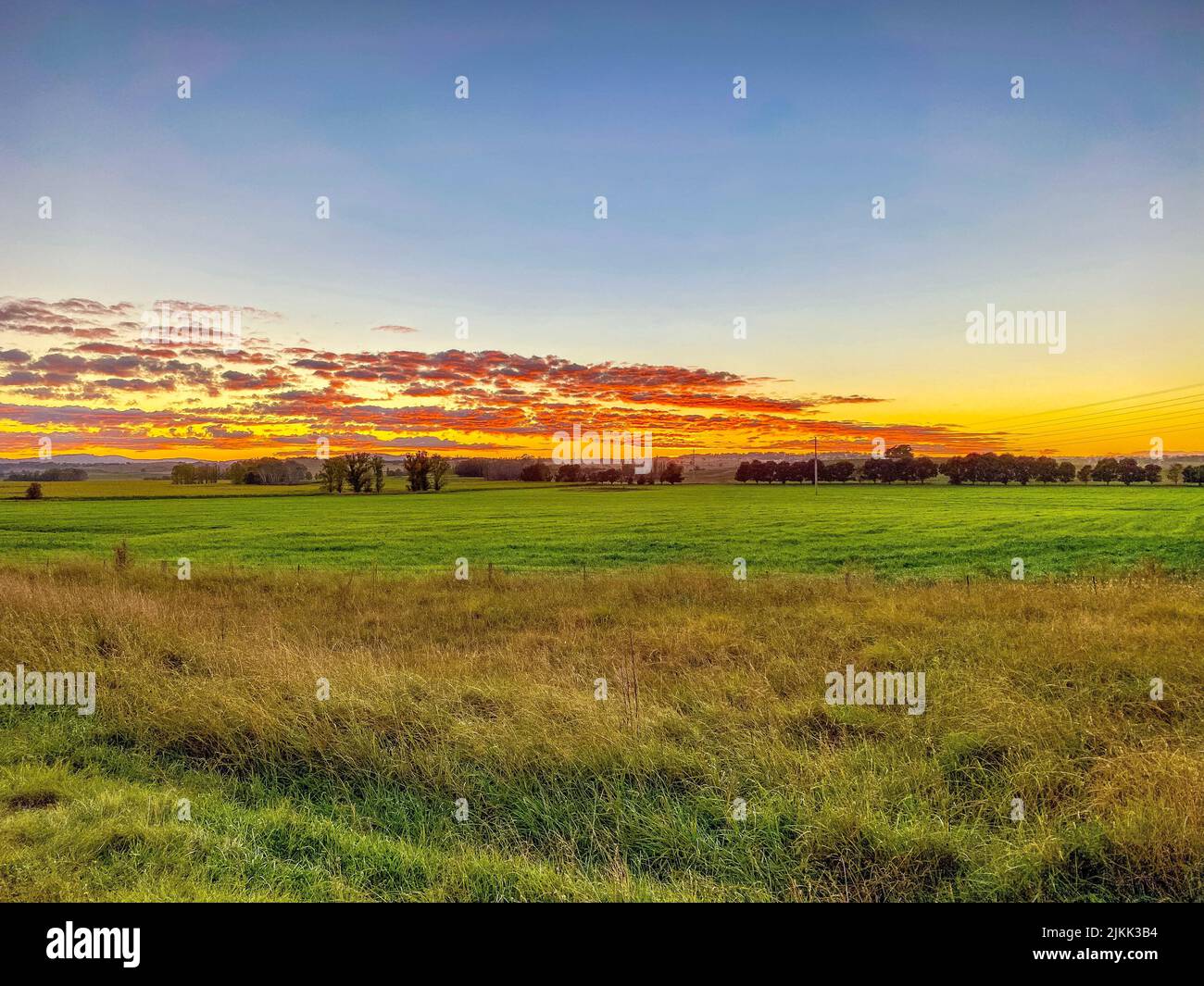 A mesmerizing view of the scenic sunrise over the field near the Glen ...