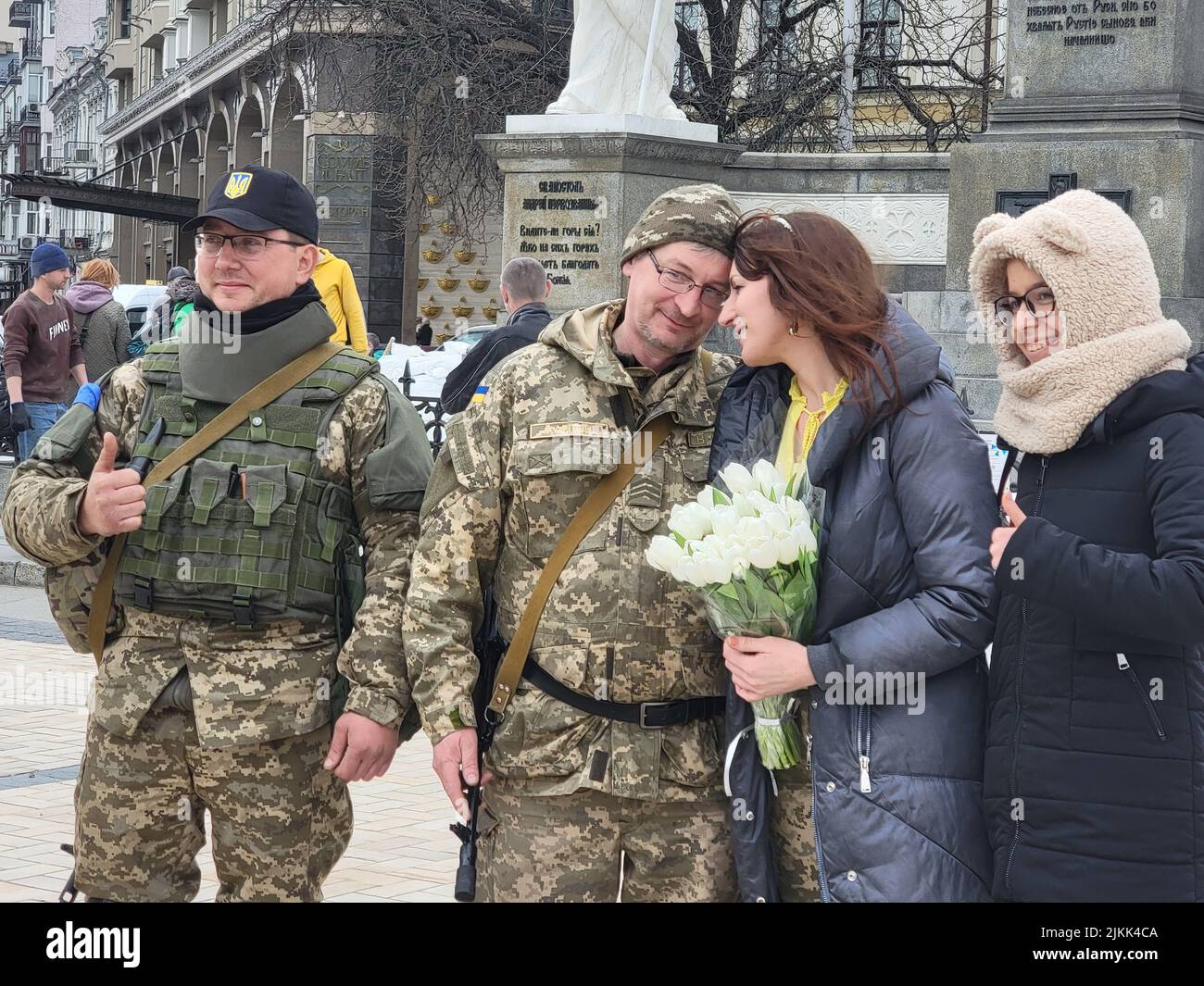 The Ukrainian soldier and his fiance get married during the attacks on Kyiv by Russian forces. Stock Photo