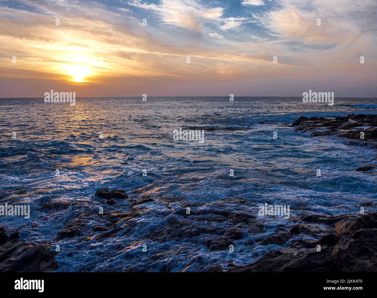 The beautiful sunset over the sea Stock Photo - Alamy