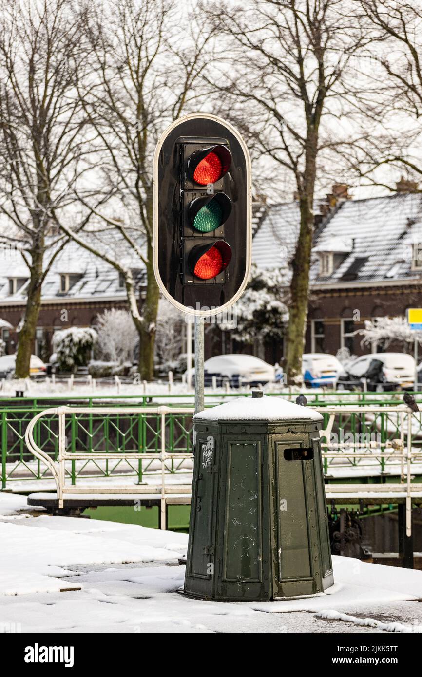 Dutch traffic sign with red lights on Leidsche Rijn canal sluice-gate in Utrecht. Stock Photo