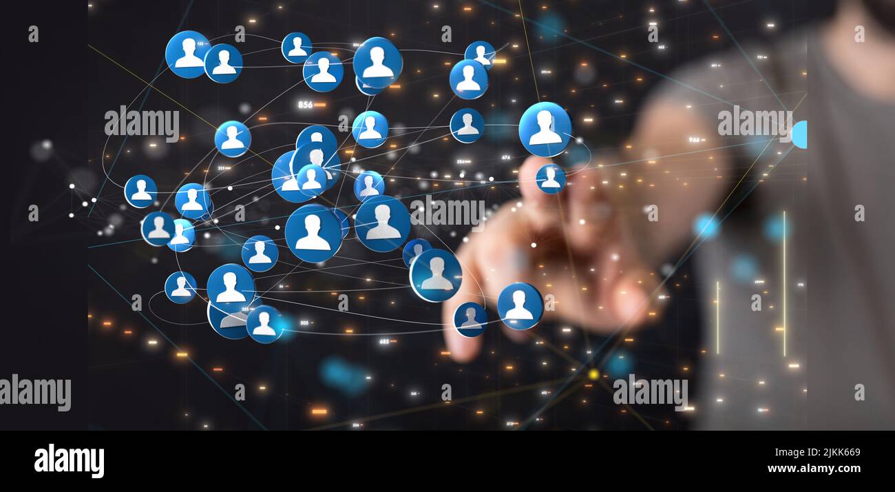 A person tapping on a hovering network with blue people icons Stock ...