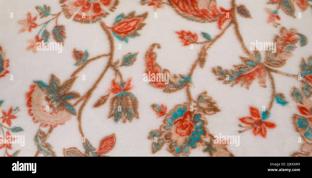 A closeup of a fabric with floral print pattern design Stock Photo