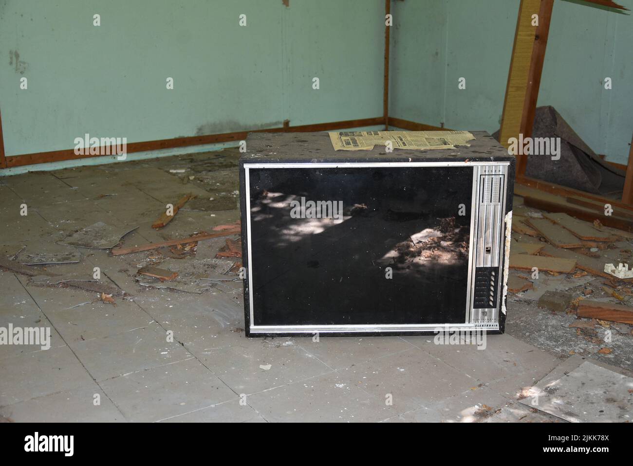 Old TV set in abandoned building Stock Photo