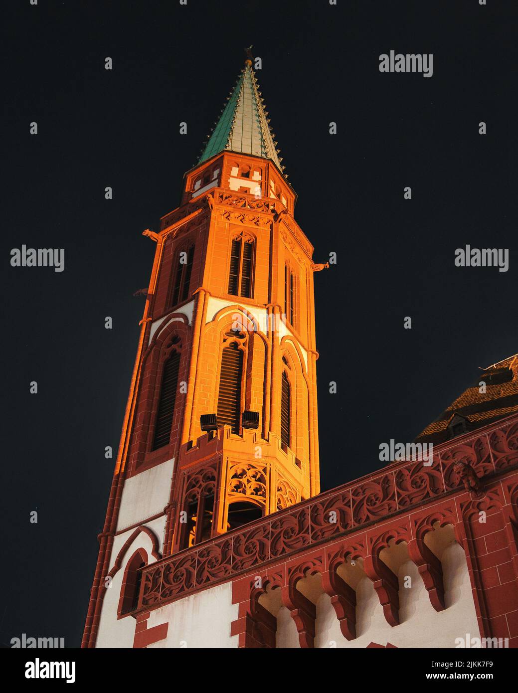 The Old St Nicholas Church in Frankfurt, Germany - a medieval Lutheran church at night Stock Photo