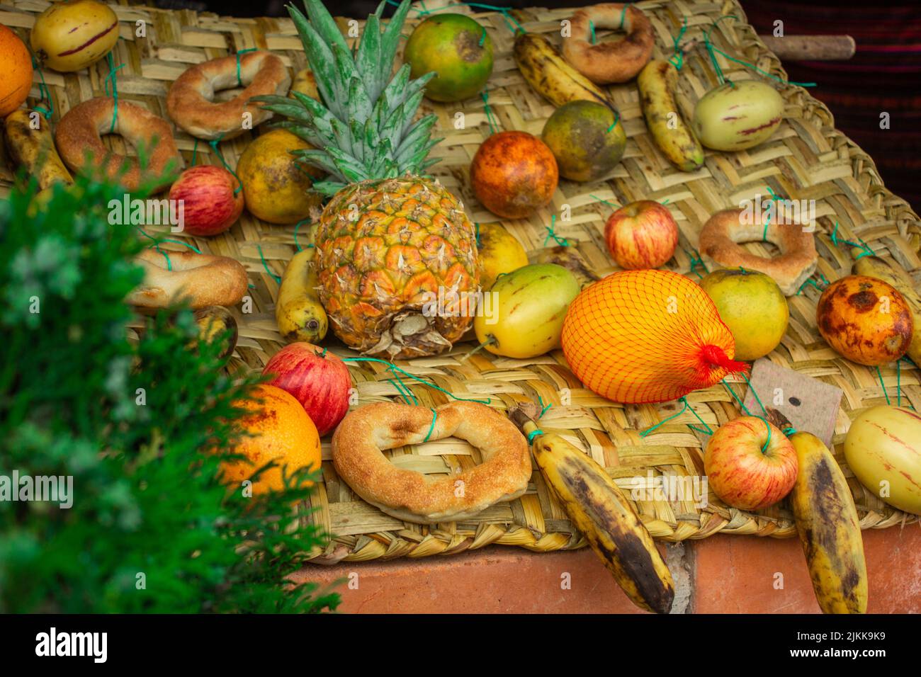 A shallow focus of fruits on a straw surface Stock Photo - Alamy
