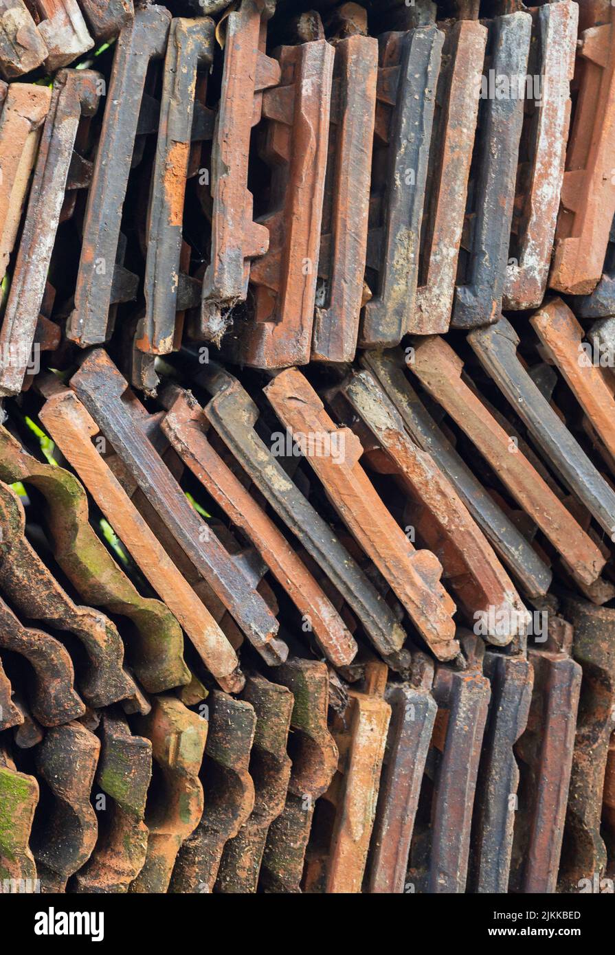 A vertical shot of a big number of roofing tiles in a daytime in Sri Lanka Stock Photo