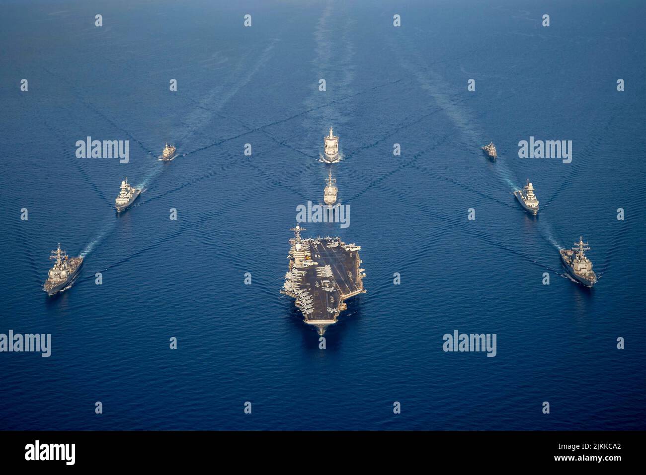 Mediterranean Sea, Italy. 24 July, 2022. Ships from Standing NATO Maritime Group 2, the Nimitz-class aircraft carrier USS Harry S. Truman, the Arleigh Burke-class guided missile destroyer USS Cole and Italian Navy Carlo Bergamini-class frigate ITS Alpino sail in formation, July 24, 2022 in the Mediterranean Sea.  Credit: MC2 Crayton Agnew/Planetpix/Alamy Live News Stock Photo