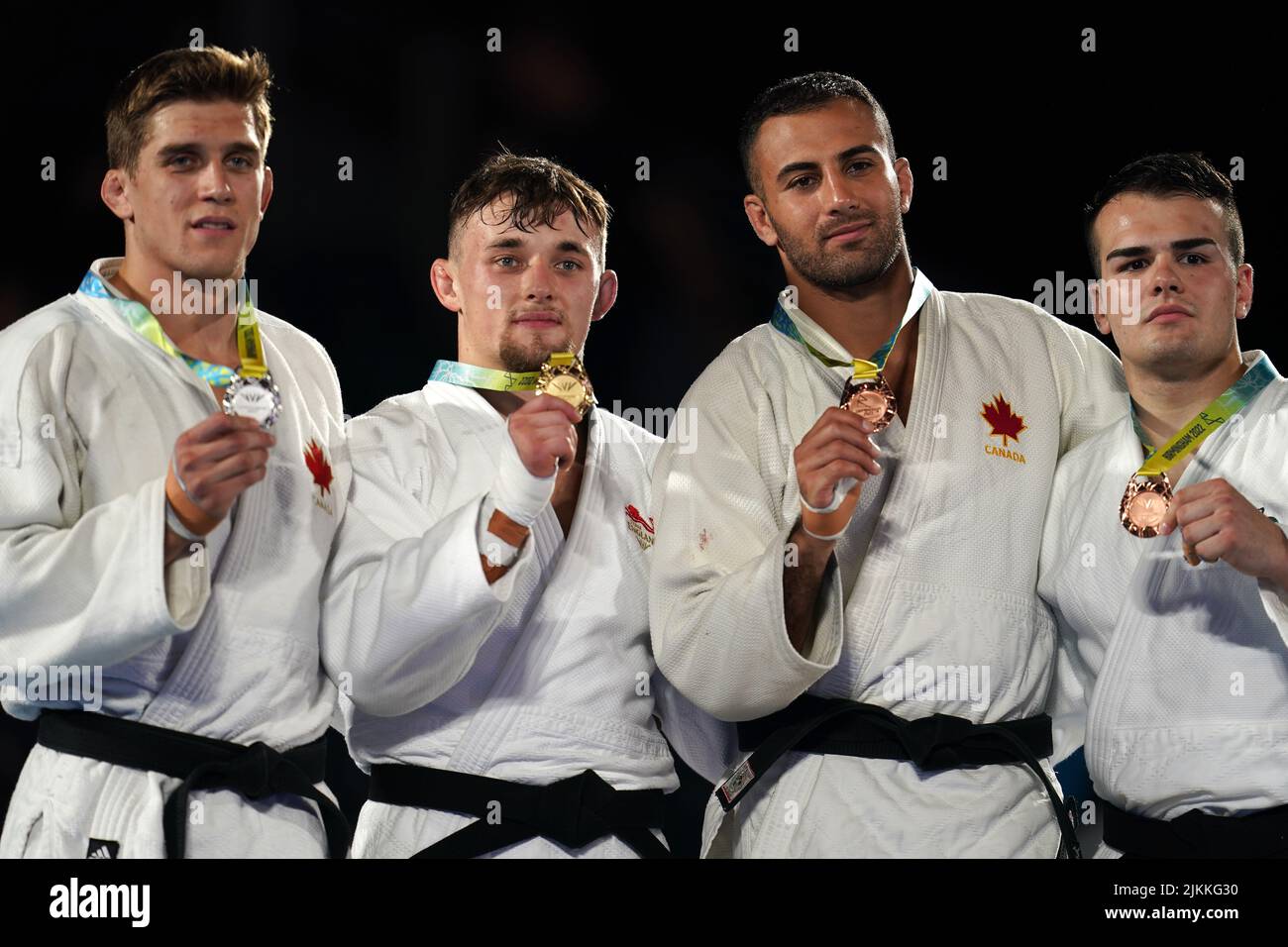 Canada's Francois Gauthier Drapeau, silver, England's Lachlan Moorhead, gold, Canada's Mohab Elnahas, bronze, and Austrlia's Uros Nikolic, bronze, after the Men's -81 kg Final at Coventry Arena on day five of the 2022 Commonwealth Games. Picture date: Tuesday August 2, 2022. Stock Photo