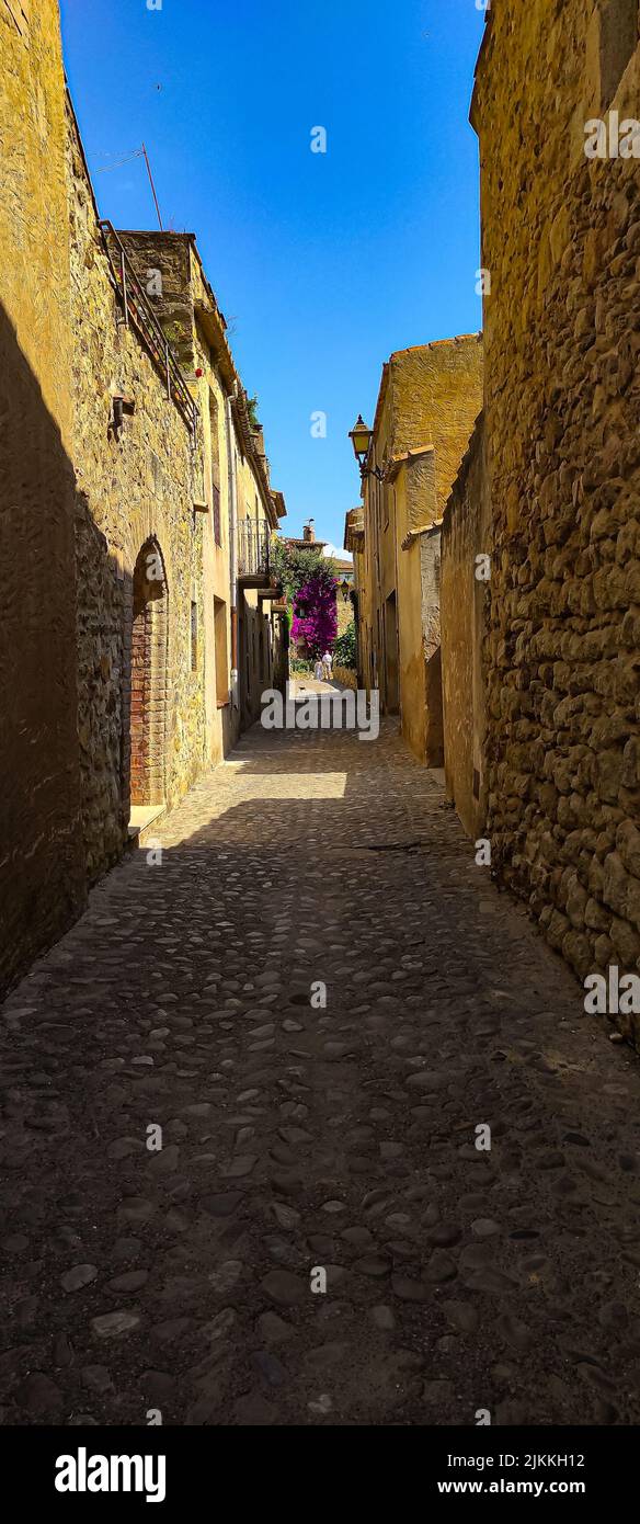 A vertical shot of an ancient narrow street in the daytime Stock Photo ...
