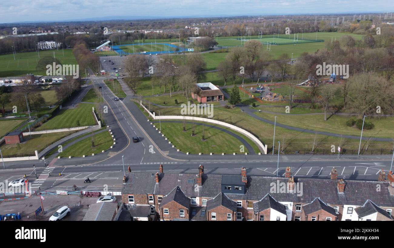 An aerial shot of cityscape Warrington with traffic road and buildings