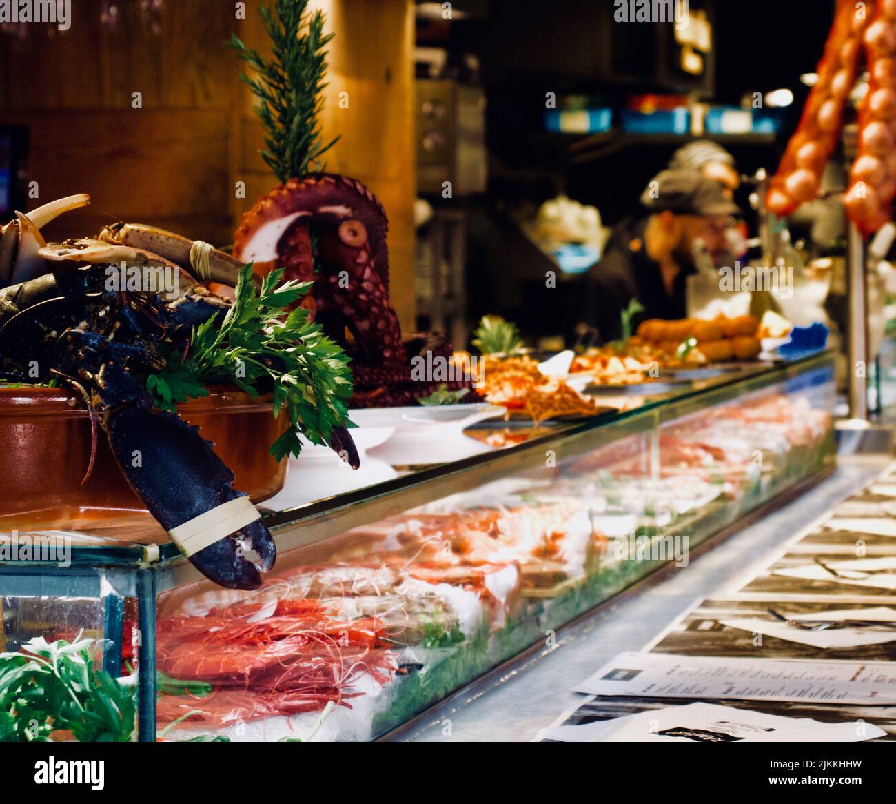 A refrigerated display case with seafood in the supermarket Stock Photo