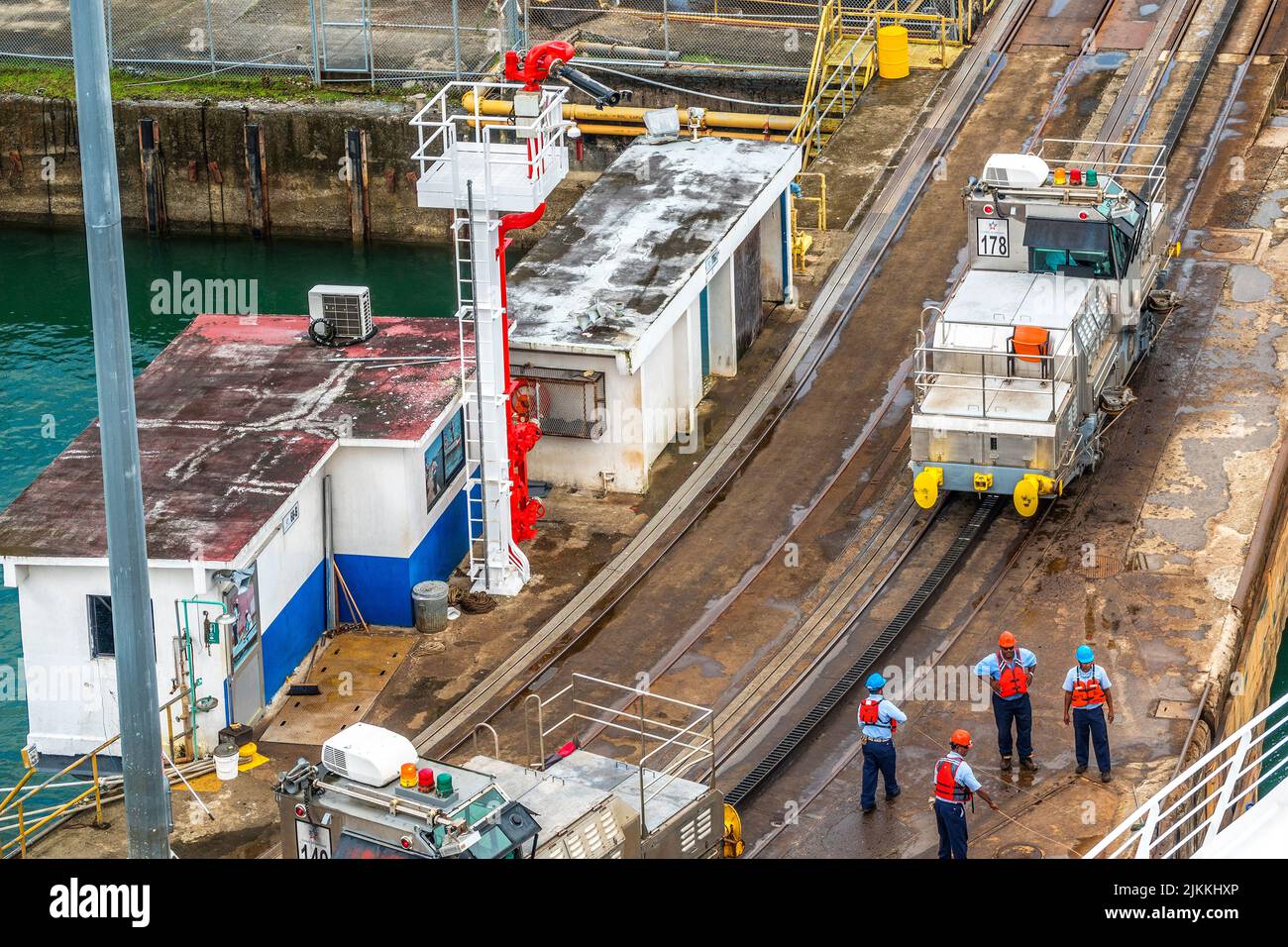 Mules Positioning Ship On The Panama Canal, Panama, Central America Stock Photo