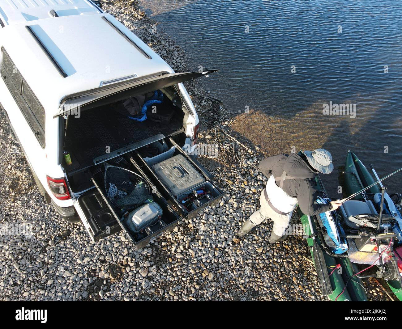 The man Getting rigged and ready still water fly fishing Stock Photo