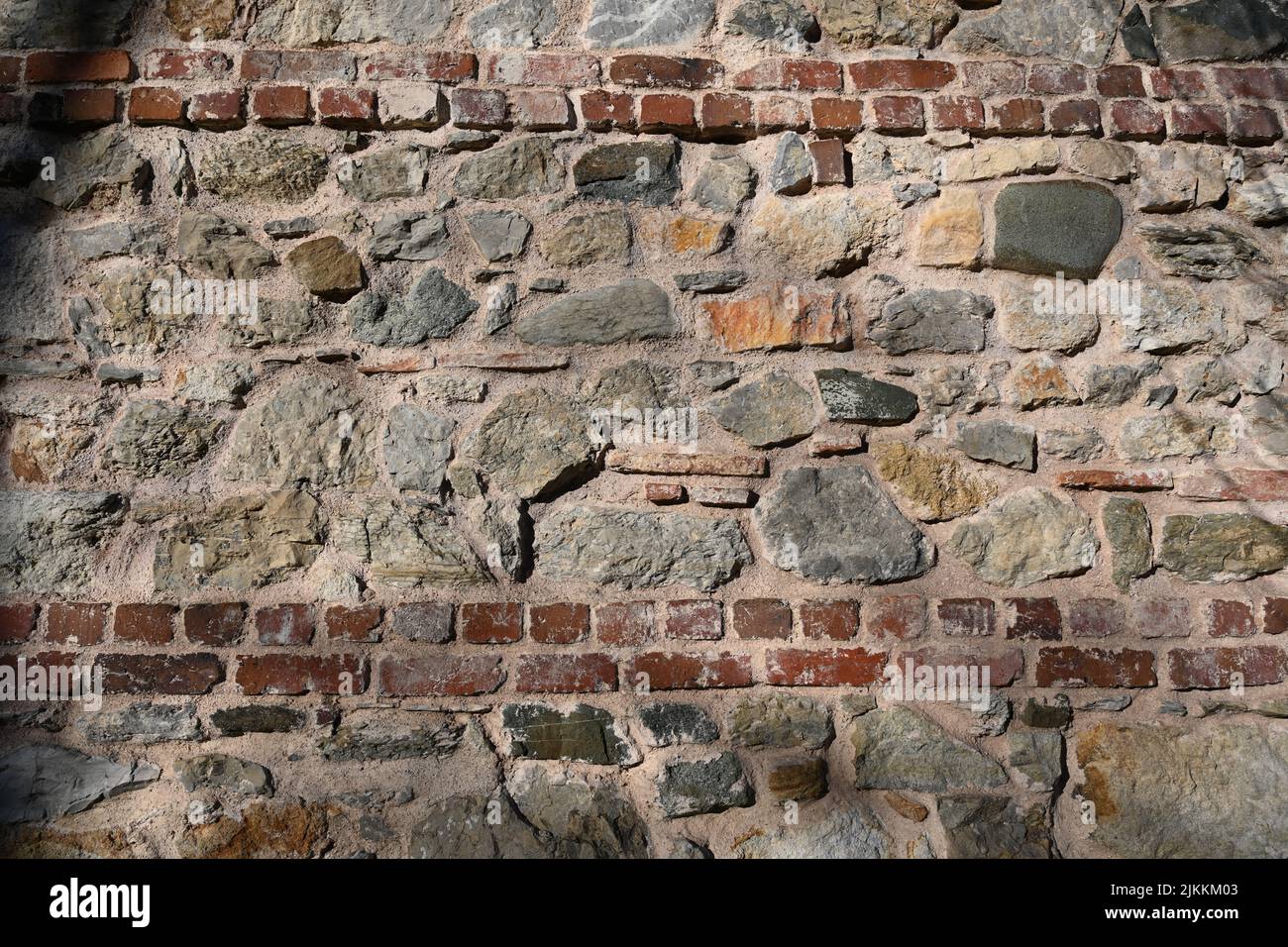 A background of a stone wall in different colors in Istanbul, Turkey Stock Photo