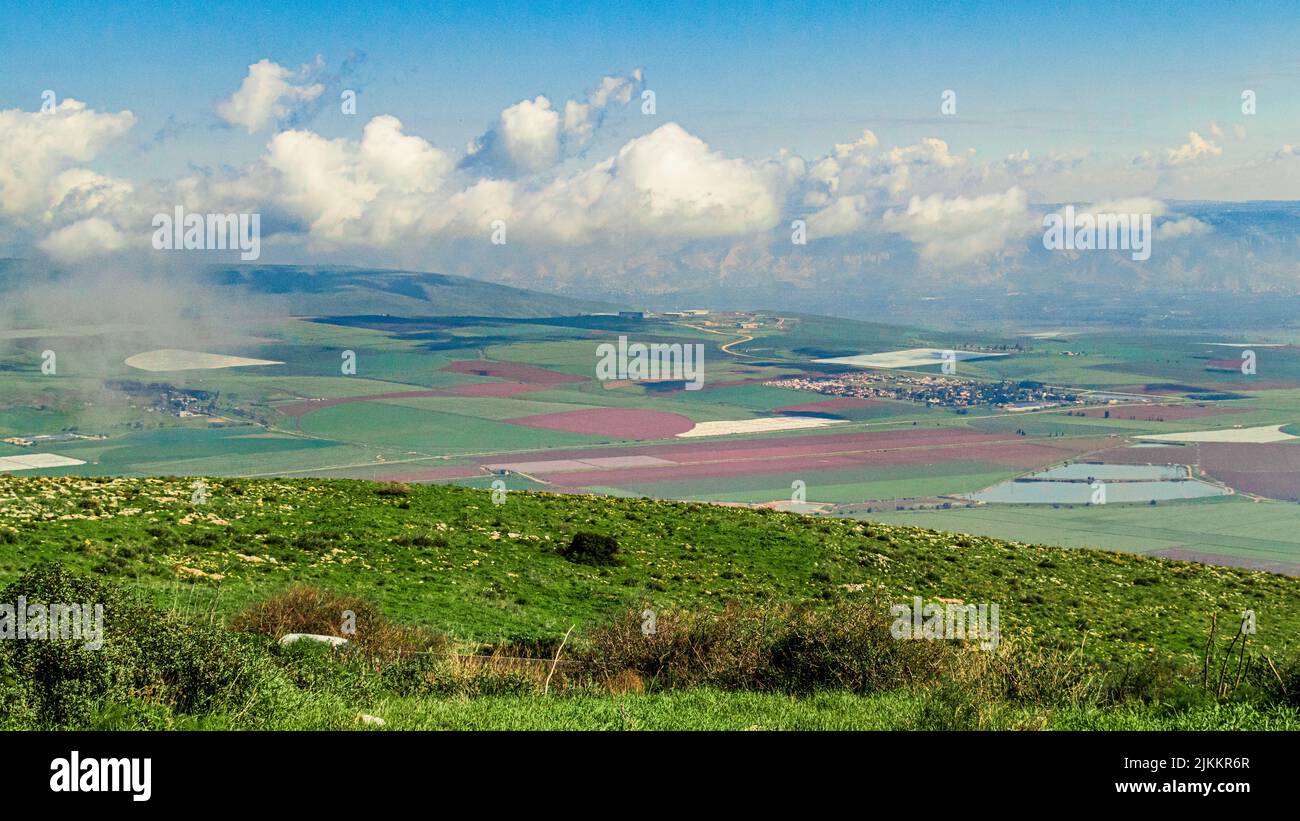 An aerial view of a sunny day over Jezreel Valley in Israel Stock Photo