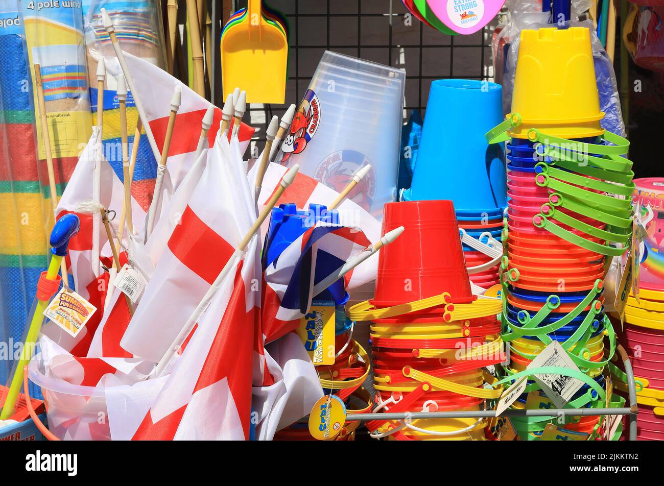 Buckets, spades and England flags on sale at a seaside shop in Broadstairs, on the Isle of Thanet, in Kent, UK Stock Photo