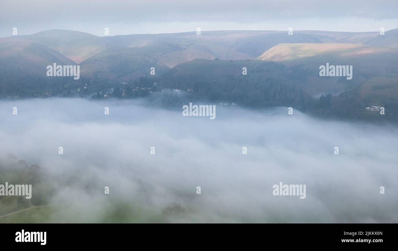 A closeup of fog covering Church Stretton, Shropshire Stock Photo