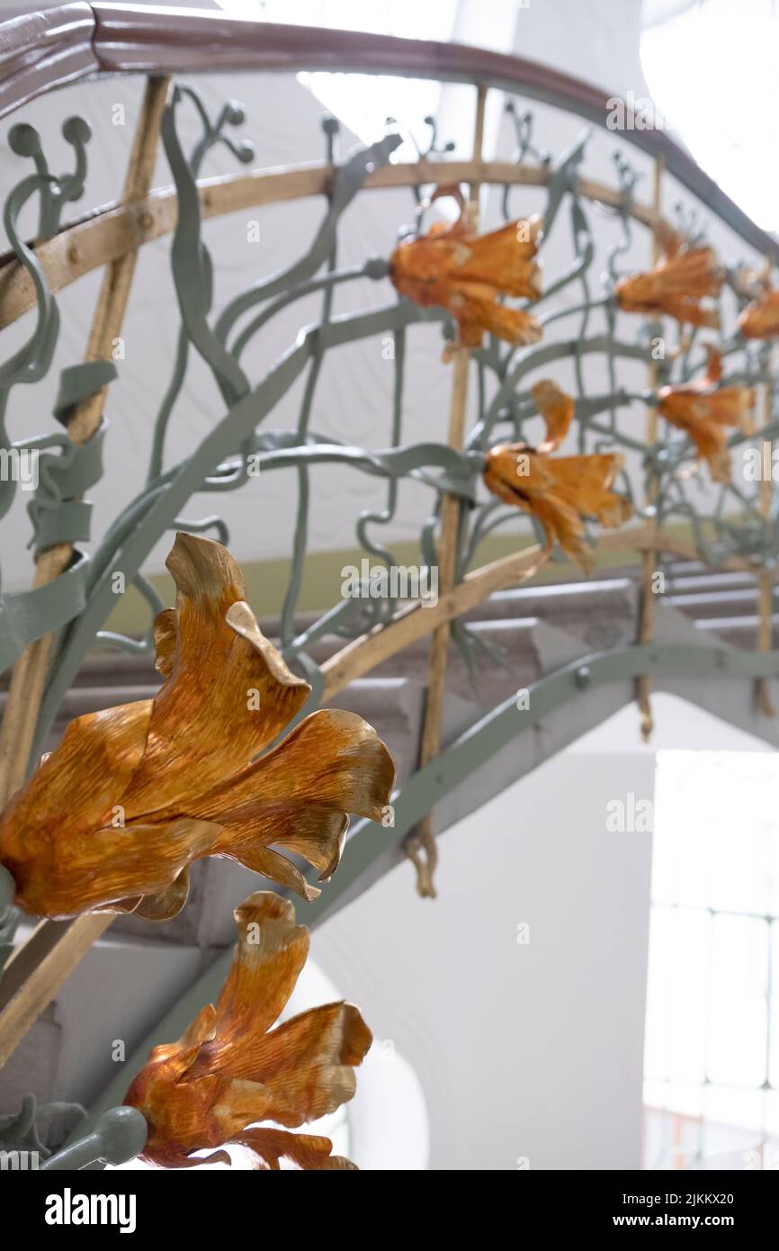 The iron lillies of the staircase inside the Reok palace in Szeged ...