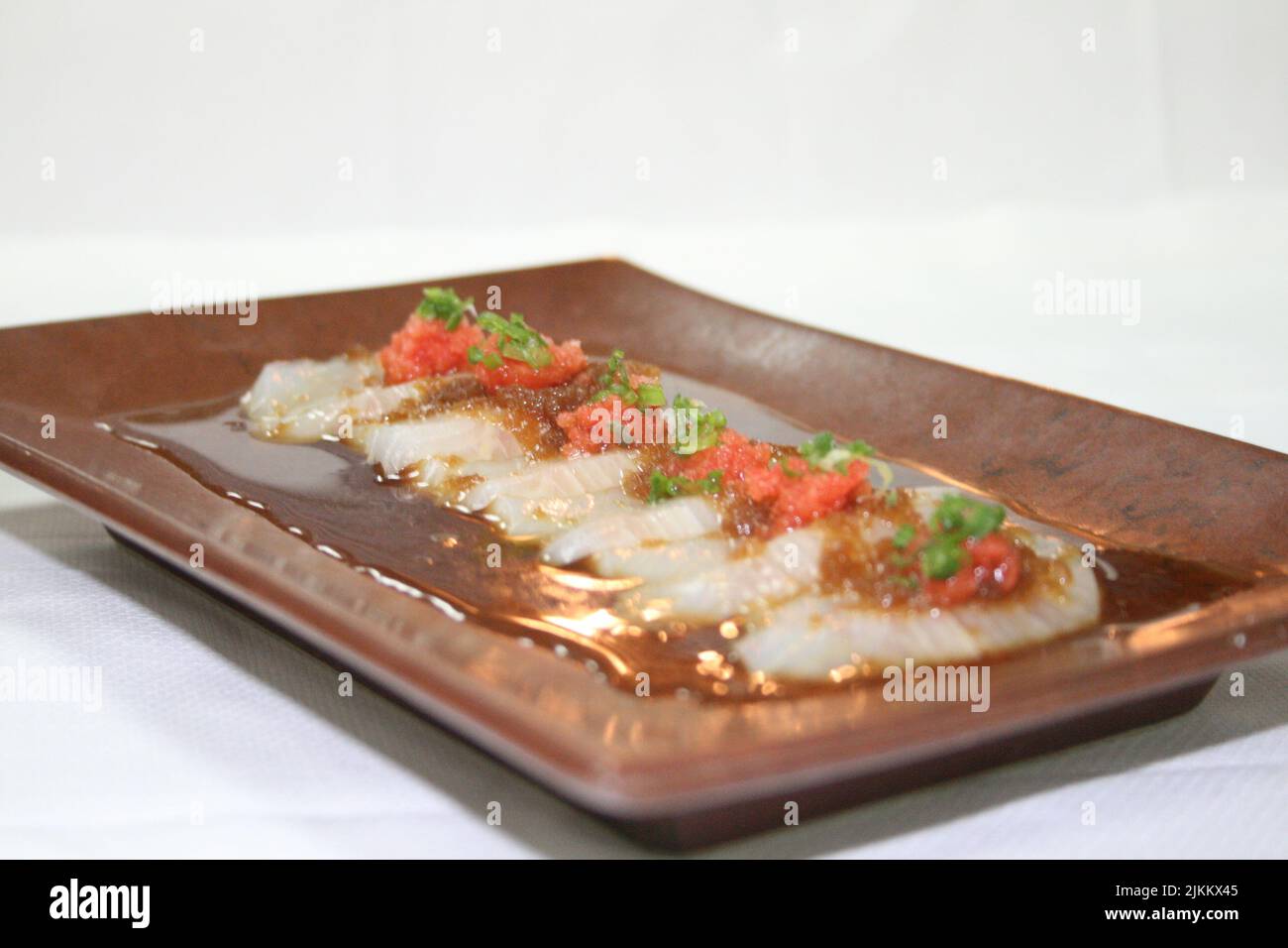 Raw fish dish hi-res stock photography and images - Alamy