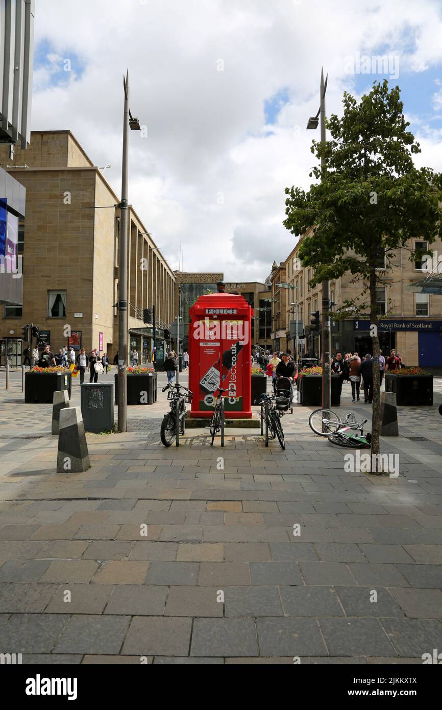 Sauchihall Streett, Glasgow, Scotland, UK. Police Box painted in bright red. Now converted to a small retail unit selling CBD Oils Concentrates Edibles. CBDtec Scotland's Original Dispensaries. Cannabis Trades Association. Stock Photo