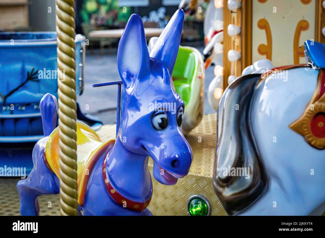 A  donkey carousel at the fairground .The old carousel in the Park of culture and recreation Stock Photo