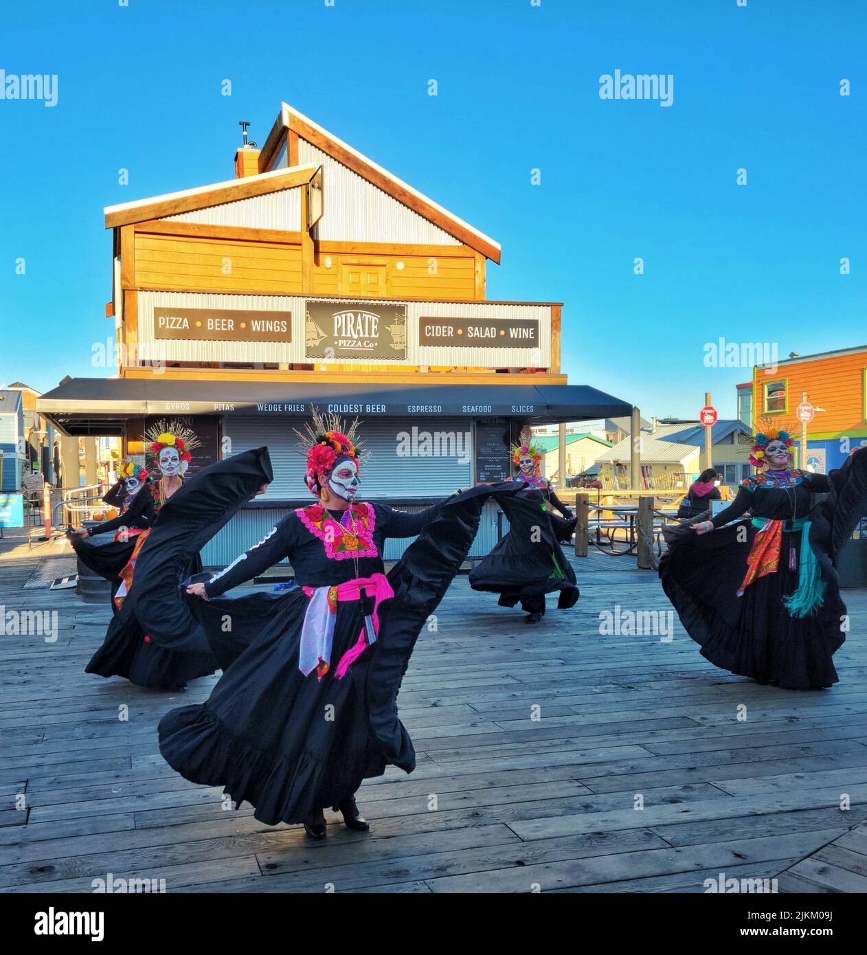 The girls with costumes dancing in Celebration of the Day of the Dead