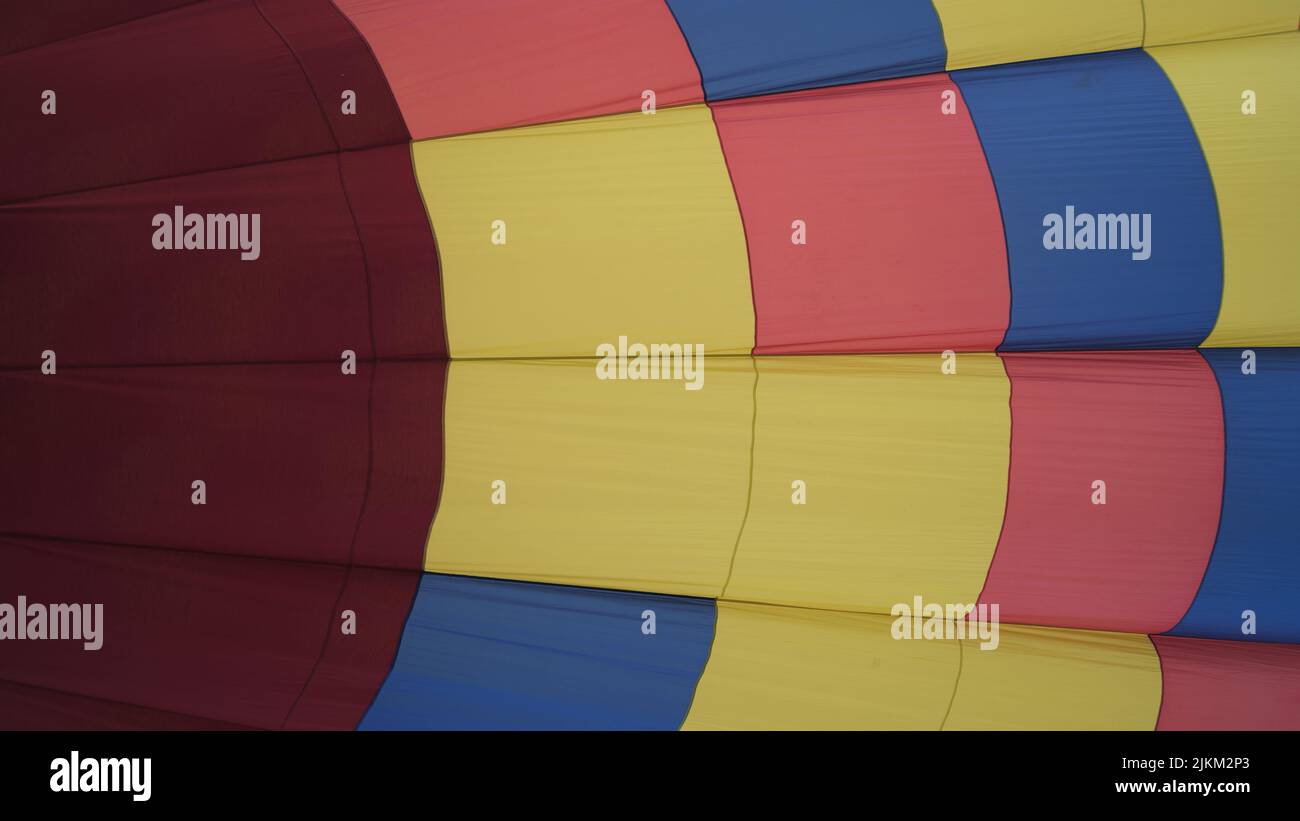 A colorful hot air balloon in blue sky Stock Photo - Alamy