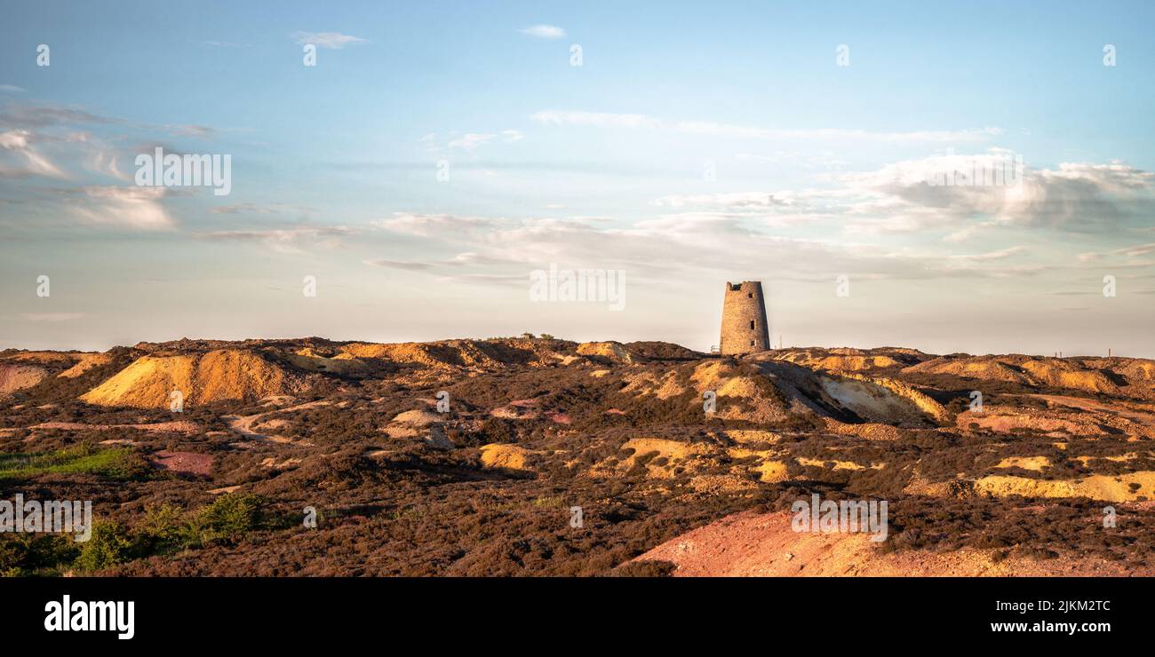 The different coloured land scape of the disused opencast copper mine on the island of Anglesey in Northern Wales Stock Photo