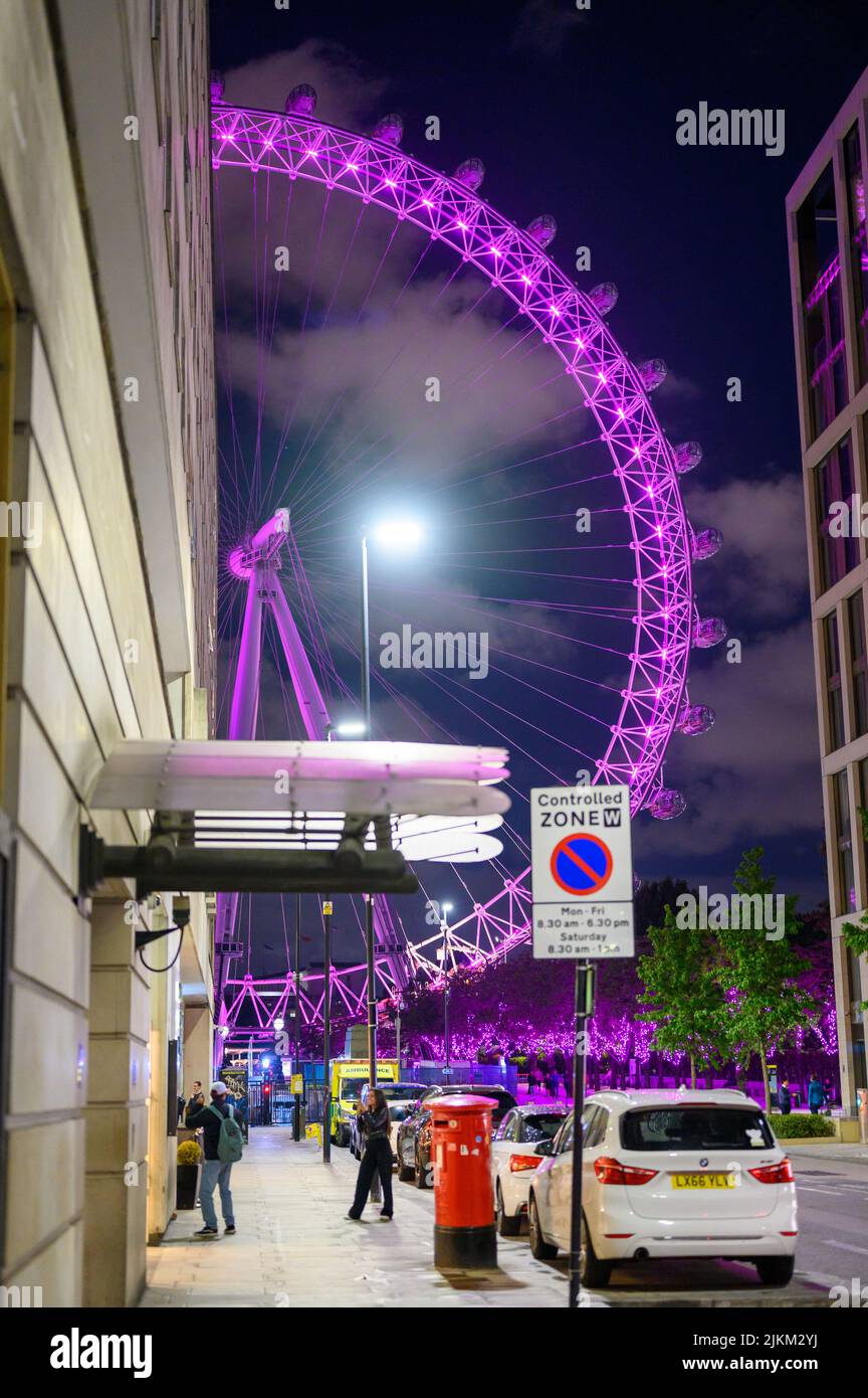 LONDON May 17, 2022 London Eye illuminated purple next to County