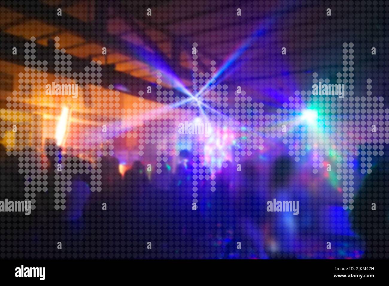 blurry scene from a music club with lighting effects with overlay dotted audio equalizer Halftone effect pattern to promote events Stock Photo
