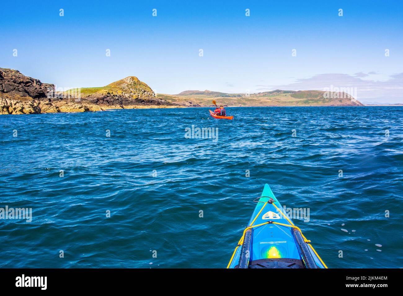 sea kayaking off the coast of the Llyn / Lleyn Peninsula near Aberdaron, North Wales, UK Stock Photo